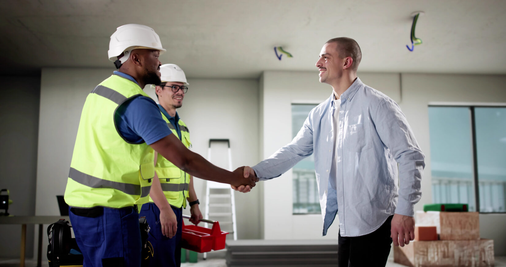 Skilled workers renovate a home, constructing new interior designs